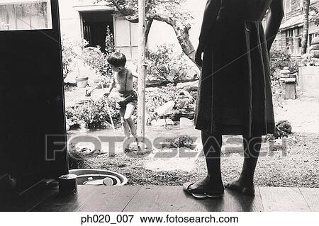 Portrait of a boy at garden View Large Photo Image Stock Photo - Portrait of a boy at garden. Fotosearch