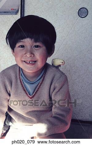 Portrait of a boy at home View Large Photo Image Stock Photo - Portrait of a boy at home. Fotosearch