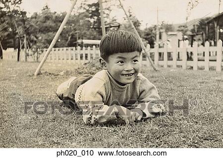 Portrait of a boy at playground View Large Photo Image Stock Image - Portrait of a boy at playground. Fotosearch