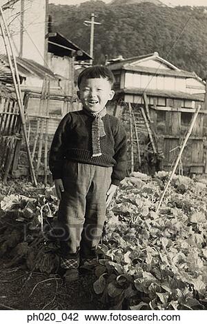 Portrait of a boy at vegetation View Large Photo Image Stock Image - Portrait of a boy at vegetation. Fotosearch
