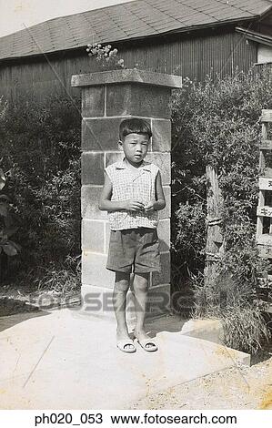 Portrait of a boy in backyard View Large Photo Image Stock Image - Portrait of a boy in backyard. Fotosearch