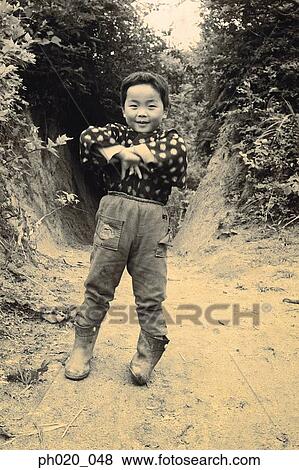 Portrait of a boy in rural area View Large Photo Image Stock Photo - Portrait of a boy in rural area. Fotosearch