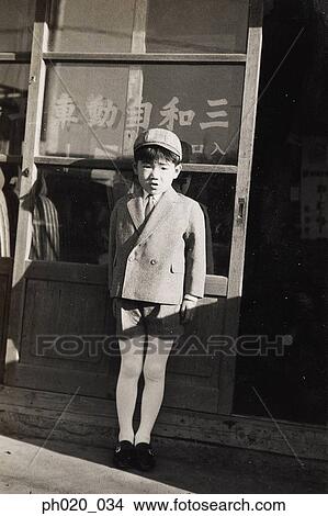 Picture - Portrait of a boy in school uniform. Fotosearch