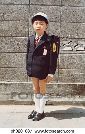 Portrait of a boy in school uniform View Large Photo Image Stock Photo - Portrait of a boy in school uniform. Fotosearch