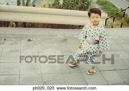 Stock Image - Portrait of a boy in traditional Japanese costume. Fotosearch