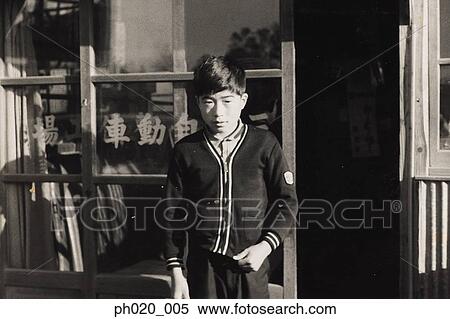 Portrait of a boy outside an office View Large Photo Image Stock Photography - Portrait of a boy outside an office. Fotosearch
