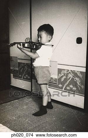 Portrait of a boy playing violin View Large Photo Image Picture - Portrait of a boy playing violin. Fotosearch