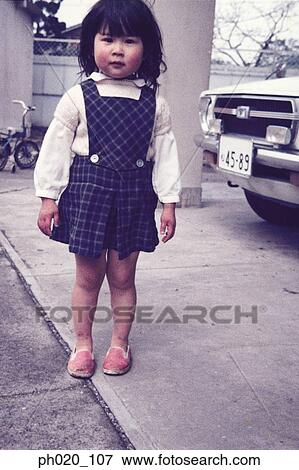 Portrait of a girl at car park View Large Photo Image Stock Photo - Portrait of a girl at car park. Fotosearch