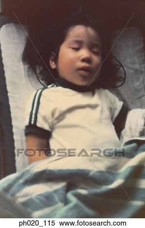 Stock Photography - Portrait of girl sleeping. Fotosearch