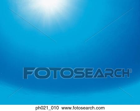 Sunlight filtering through water surface View Large Photo Image Stock Image - Sunlight filtering through water surface . Fotosearch