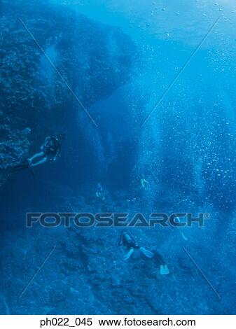 Stock Photography - Group of scuba divers. Fotosearch
