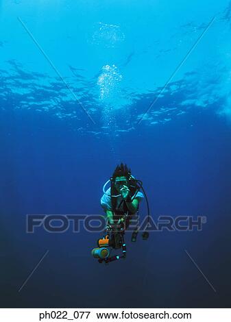 Scuba diver and camera View Large Photo Image Stock Photo - Scuba diver and camera. Fotosearch