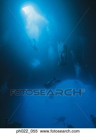 Scuba divers in cave, underwater view View Large Photo Image Stock Photography - Scuba divers in cave, underwater view. Fotosearch