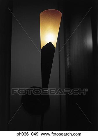Lighted wall lamp View Large Photo Image Stock Photo - Lighted wall lamp. Fotosearch