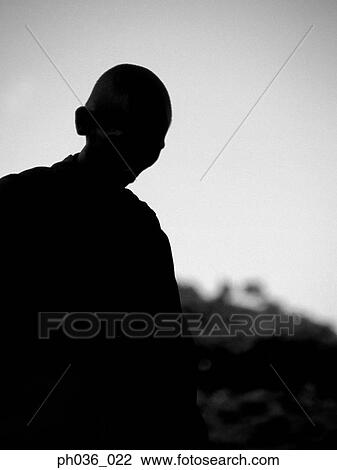 Stock Image - Silhouetted human figure. Fotosearch