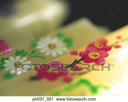 Flower paintings on bamboo sticks View Large Photo Image Stock Image - Flower paintings on bamboo sticks. Fotosearch
