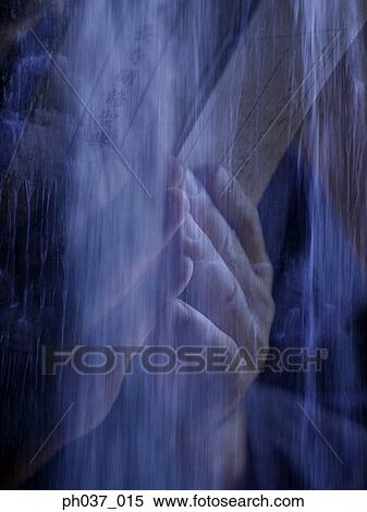 Stock Photography - Human hands holding book. Fotosearch