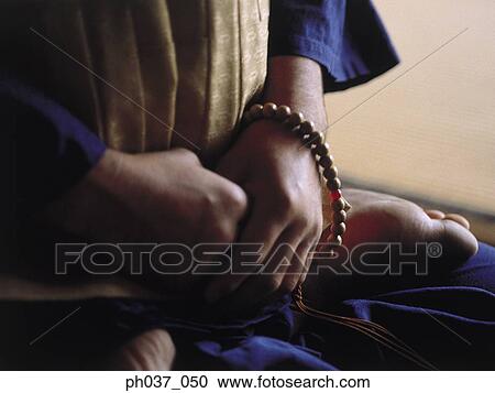 Stock Image - Meditation sitting posture. Fotosearch