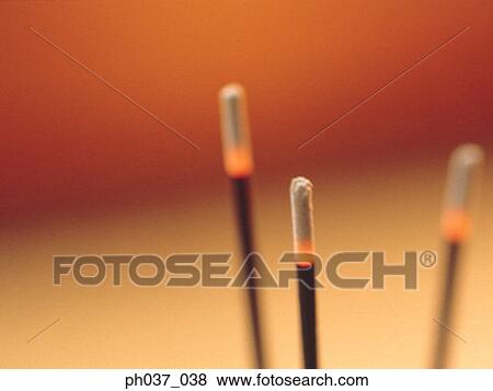 Three burning joss sticks View Large Photo Image Stock Photo - Three burning joss sticks. Fotosearch