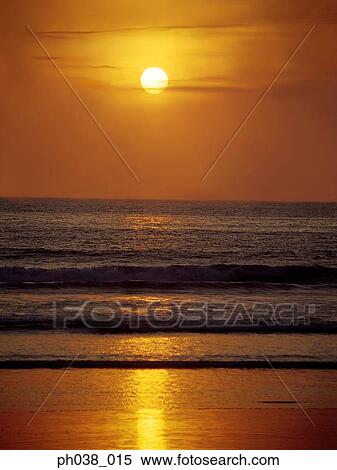 Stock Photography - Beach at sunset. Fotosearch