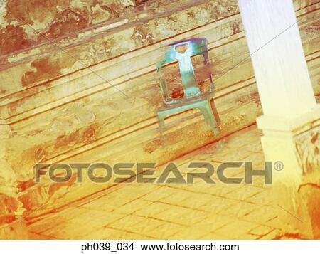 Picture - Chair floating in the air. Fotosearch