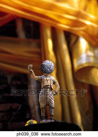 Statue of a human figurine View Large Photo Image Stock Photograph - Statue of a human figurine. Fotosearch