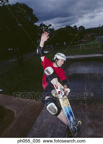Stock Photography - Man skateboarding on ramp . Fotosearch