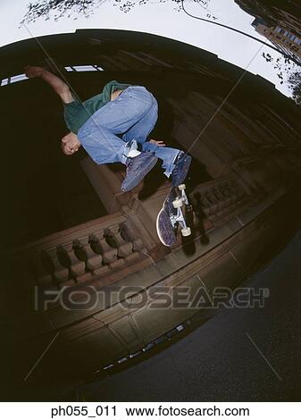 Skateboarder in mid air View Large Photo Image Stock Image - Skateboarder in mid air. Fotosearch