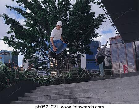 In-line skater in mid-jump View Large Photo Image Stock Image - In-line skater in mid-jump . Fotosearch