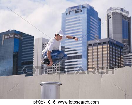 In-line skater in mid-jump View Large Photo Image Stock Photograph - In-line skater in mid-jump . Fotosearch