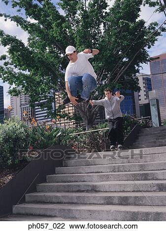 In-line skaters in mid-jump View Large Photo Image Stock Image - In-line skaters in mid-jump . Fotosearch