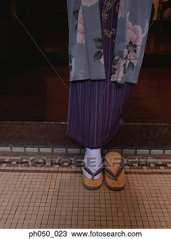 Japanese woman in kimono and clogs View Large Photo Image Stock Image - Japanese woman in kimono and clogs. Fotosearch