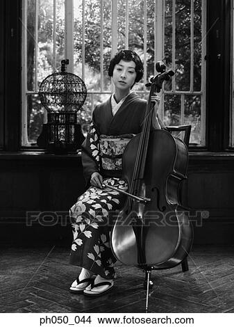Japanese woman in kimono holding double bass View Large Photo Image Picture - Japanese woman in kimono holding double bass . Fotosearch