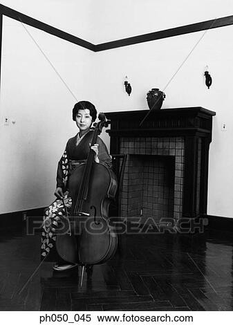Japanese woman in kimono holding double bass View Large Photo Image Stock Photography - Japanese woman in kimono holding double bass . Fotosearch