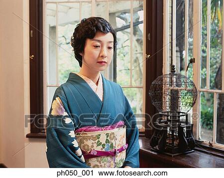 Stock Image - Japanese woman in kimono, portrait . Fotosearch
