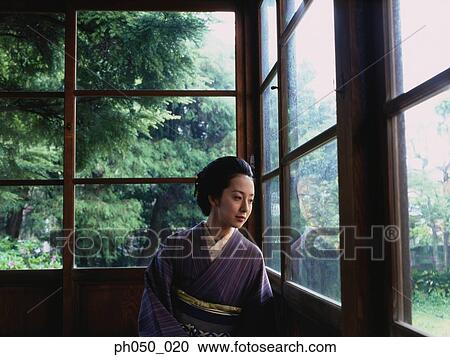 Japanese woman in kimono, portrait View Large Photo Image Stock Image - Japanese woman in kimono, portrait . Fotosearch