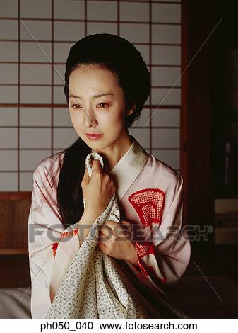 Japanese woman in kimono, portrait View Large Photo Image Stock Image - Japanese woman in kimono, portrait . Fotosearch