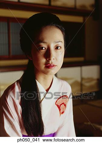 Japanese woman in kimono, portrait View Large Photo Image Stock Image - Japanese woman in kimono, portrait . Fotosearch