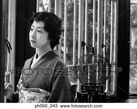 Stock Image - Japanese woman in kimono, portrait . Fotosearch
