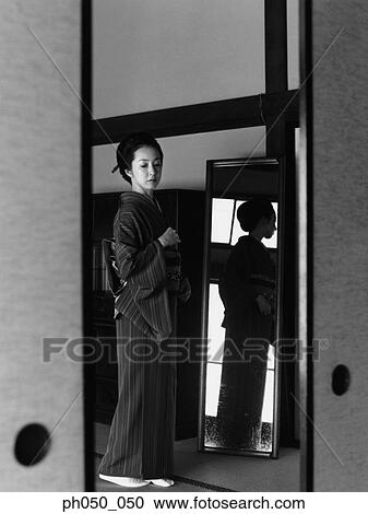 Japanese woman in kimono, portrait View Large Photo Image Stock Image - Japanese woman in kimono, portrait . Fotosearch