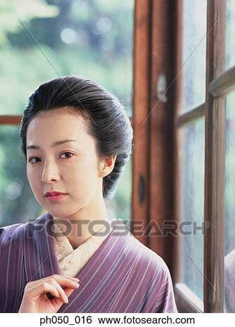 Japanese woman in kimono, portrait View Large Photo Image Stock Photograph - Japanese woman in kimono, portrait . Fotosearch