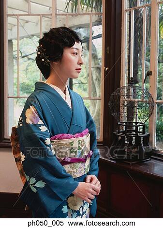 Japanese woman in kimono, portrait View Large Photo Image Stock Photography - Japanese woman in kimono, portrait . Fotosearch