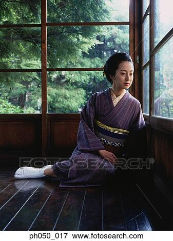 Japanese woman in kimono, sitting on floor View Large Photo Image Stock Photo - Japanese woman in kimono, sitting on floor. Fotosearch