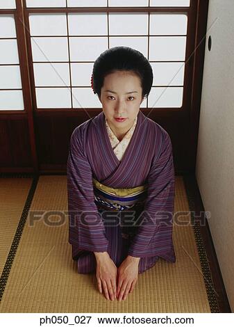 Japanese woman in kimono, sitting on floor View Large Photo Image Stock Photo - Japanese woman in kimono, sitting on floor. Fotosearch