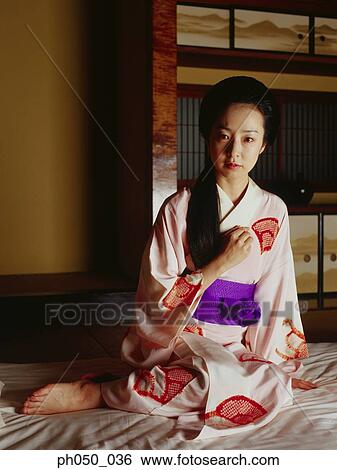 Japanese woman in kimono, sitting on floor View Large Photo Image Stock Photograph - Japanese woman in kimono, sitting on floor. Fotosearch