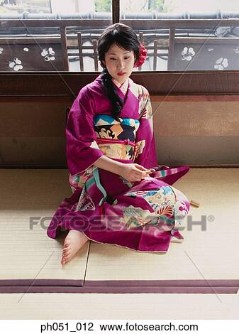 Japanese woman in kimono, sitting on floor Stock Image | ph051_012 ...