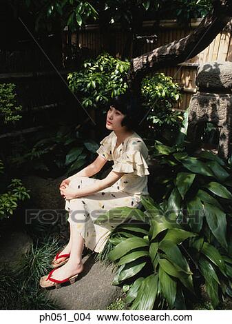 Woman in Japanese garden View Large Photo Image Picture - Woman in Japanese garden. Fotosearch