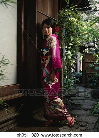 Woman in Japanese garden, portrait View Large Photo Image Stock Image - Woman in Japanese garden, portrait. Fotosearch