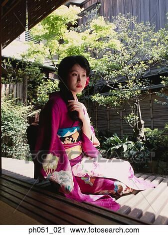 Woman in Japanese garden, portrait View Large Photo Image Stock Image - Woman in Japanese garden, portrait. Fotosearch