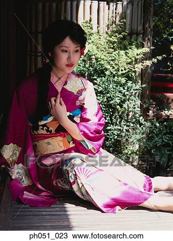 Woman in Japanese garden, portrait View Large Photo Image Stock Image - Woman in Japanese garden, portrait. Fotosearch